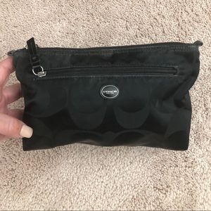 Coach makeup case.